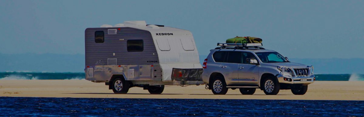 Picture Of A Caravan Being Towed By A Car - Mandurah Caravan Repairs