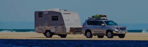 Picture Of A Caravan Being Towed By A Car - Mandurah Caravan Repairs